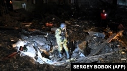 Місце влучання російської ракети в Харкові, 23 січня 2023 року. За даними Генштабу, протягом останнього тижня на Харківщині внаслідок обстрілів загинули 16 осіб