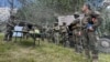 În imagine, militari din Grupul de Luptă NATO, de la Centrul de Instruire pentru Luptă al Forţelor Terestre, de la Cincu, al Armatei Române.