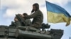 Українські бійці на танку біля Бахмуту, 12 травня 2023 року