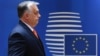 Hungarian Prime Minister Viktor Orban arrives for an EU summit in Brussels. Can Brussels outmaneuver Budapest on Russia sanctions? (file photo)