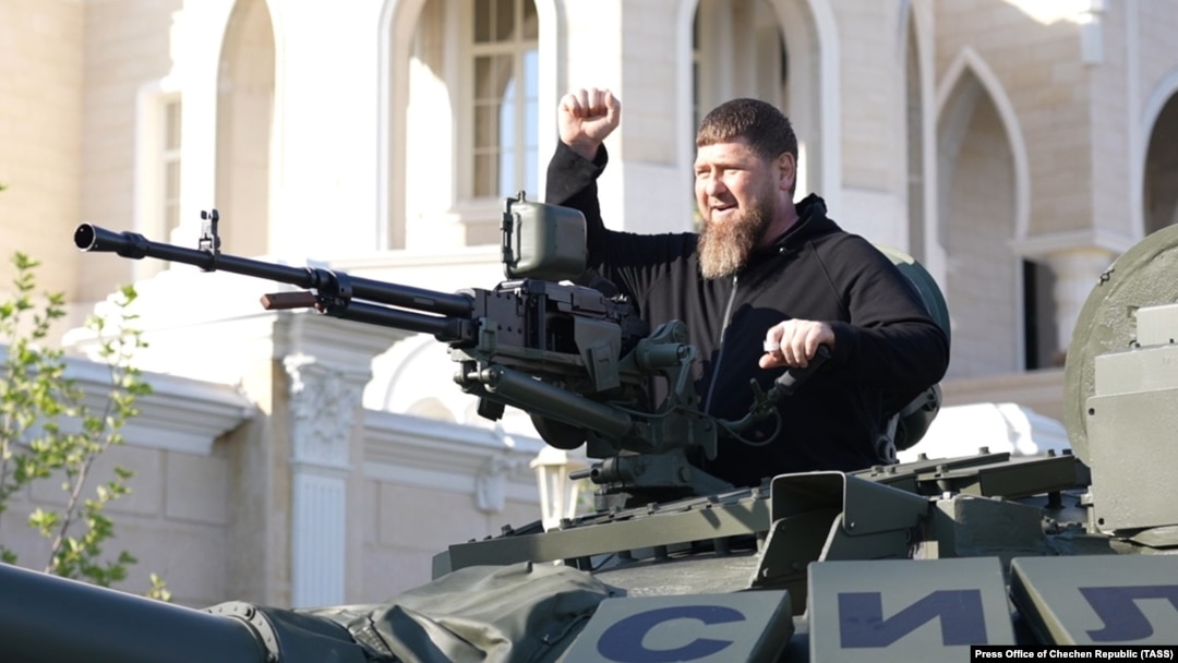 Kremlin-backed Chechen autocrat Ramzan Kadyrov takes a ride on an upgraded T-72 tank in Grozny in May 17.
