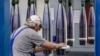 A man works on an assembly line making shells at a weapons factory in Germany. (file photo)