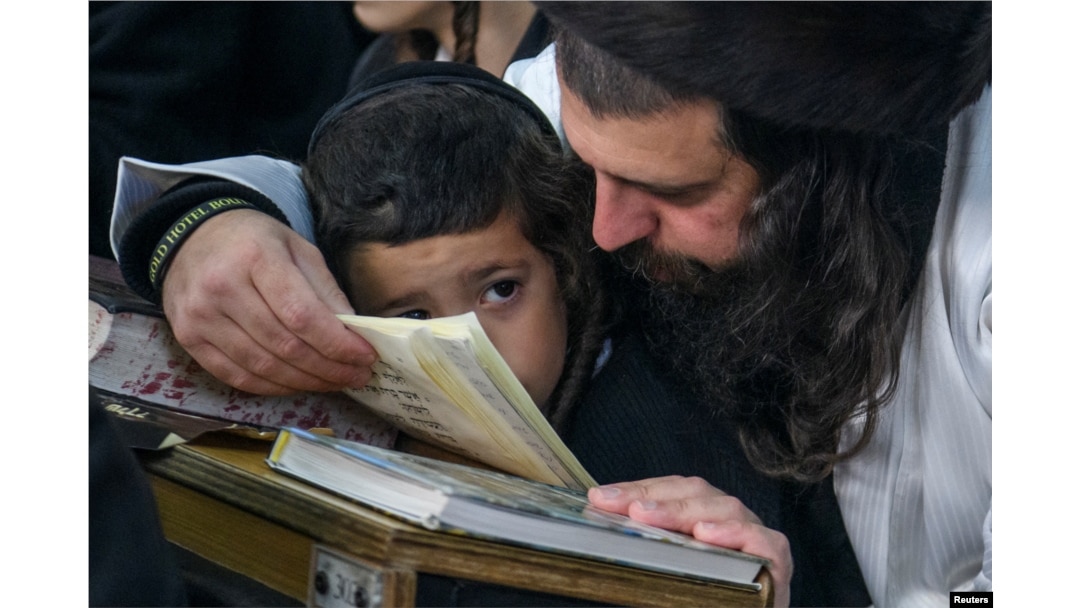 Hasidic Jewish pilgrims pray during the Rosh Hashanah holiday in Uman on September 25.