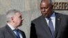 U.S. Defense Secretary Lloyd Austin (right) and Ukrainian Defense Minister Andriy Taran in Kyiv on October 19.