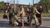 A video released by the Russian Defense Ministry on May 17 shows Ukrainian soldiers as they are searched by separatist military personnel after leaving the besieged Azovstal steel plant in the port city of Mariupol.