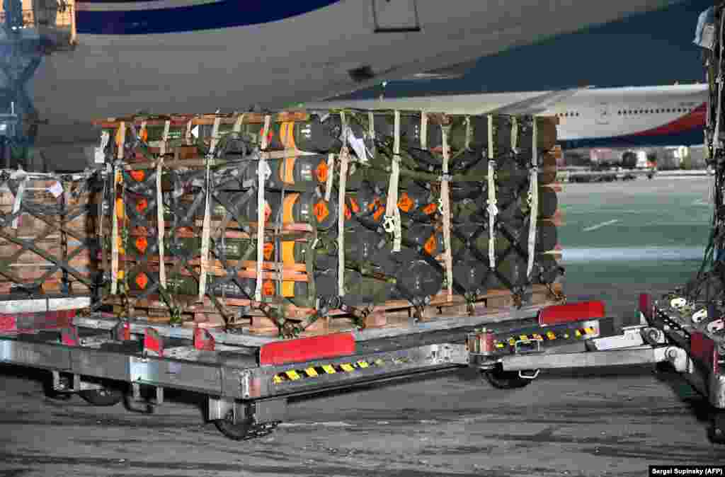 A pallet of military supplies arrives at Kyiv's Boryspil Airport on January 25. Hundreds of tons of ammunition and weapons have been flown to Ukraine from the United States. 