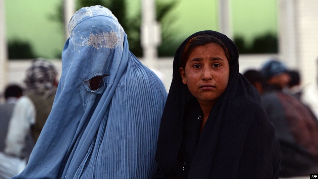 An Afghan woman pictured here with her daughter (file photo)