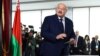 Belarusian authoritarian ruler Alyaksandr Lukashenko votes during the presidential election in Minsk on January 26.