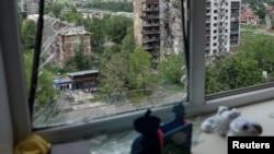 Наслідки попередніх російських ударів у Покровську, архівне фото