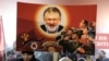 Плакат з карикатурою Ігоря Коломойського під час акції «За ринок землі» під Офісом президента України. Її учасники вимагали «нормальної праволіберальної земельної реформи не під конкретних осіб, а для українців». Київ, 24 жовтня 2019 року