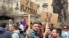 Protesters streamed into the Serbian capital on March 15 ahead of the demonstrations.