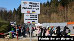 Польща. Українські біженці на прикордонному пункті пропуску в Кросценко. Березень 2022 року
