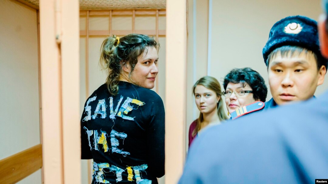 Greenpeace activist Anne Mie Roer Jensen (left) of Denmark looks on during a hearing at the Primorskiy Court in St. Petersburg on November 20.