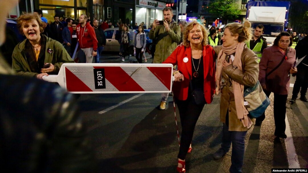 Protesters rally in central Belgrade against the Serbian government on April 6.