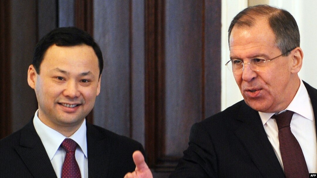 RussianForeign Minister Sergei Lavrov (R) and Kyrgyz counterpart Ruslan Kazakbaev at a meeting in Moscow in late March