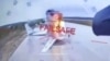 A Russian military aircraft is seen burning on video footage from a Ukrainian drone attacking the Belaya air base, near Russia's border with Mongolia.