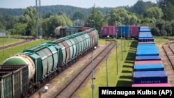 Lithuania Russia -- Cargo trains wagons from Russian enclave Kaliningrad are seen at the border railway station in Kybartai, some 200 kms (124 miles) west of the capital Vilnius, Lithuania, Wednesday, June. 22, 2022.