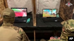 Russian servicemen train to operate military drones at an undisclosed location on May 26.