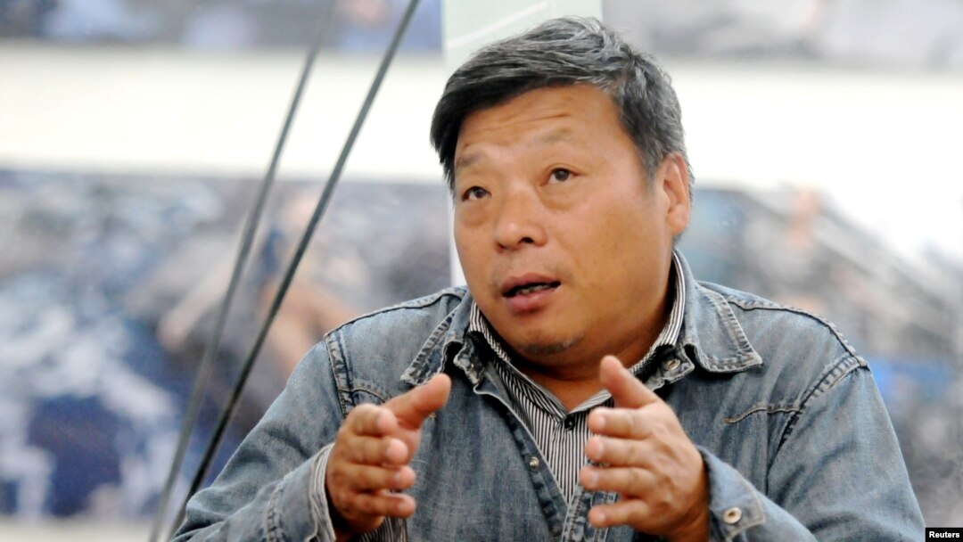 Chinese photographer Lu Guang attends a photography festival in Pingyao, China, in September 2014.