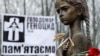 Архівна світлина. Скульптура дівчинки з колосками в руках на території Національного музею Голодомору-геноциду, в якому зібрані численні документальні матеріали про Голодомор-геноцид в Україні 1932–1933 років