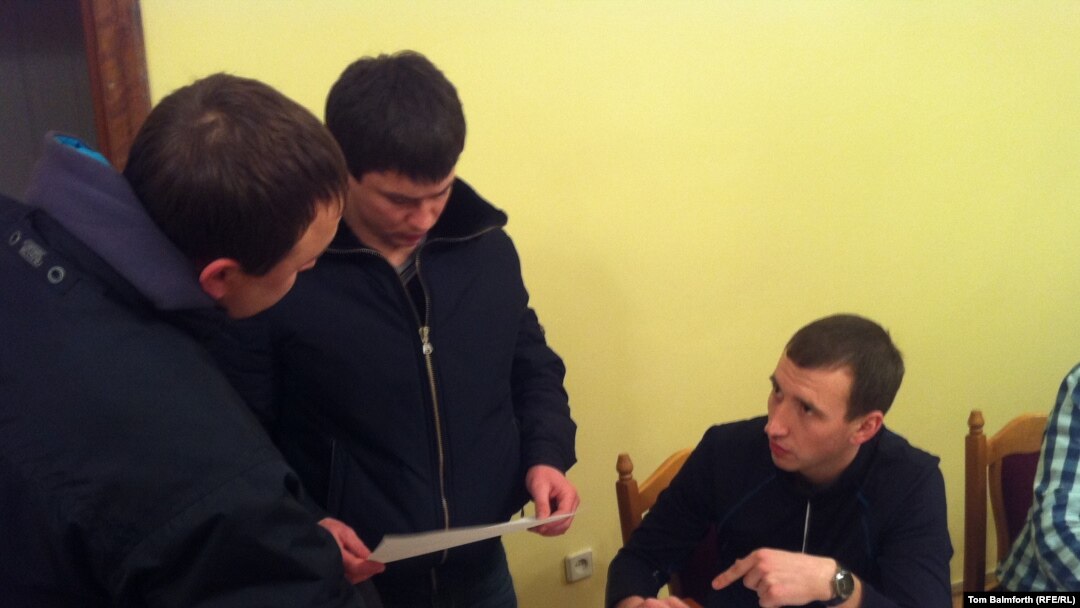 Volunteers sign up for patrols to maintain law and order in the city of Lviv.