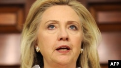 U.S. -- Secretary of State Hillary Clinton makes a statement to the press on US sanctions on Syrian oil, at the State Department in Washington, DC, 18Aug2011
