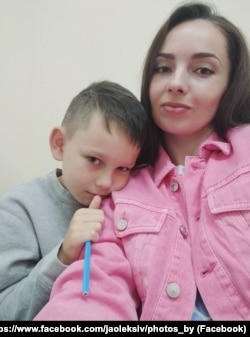 Roman Oleksiv pictured with his mother, Halyna, who was killed in the Russian missile attack that wounded her son