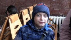With Humanitarian Help, Ukrainian Children Cross The Country Toward Safety
