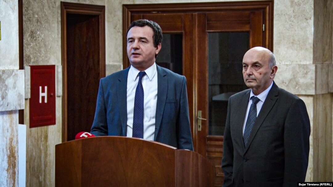 Albin Kurti (left) and Isa Mustafa hold a press conference after reaching an agreement to form the new government coalition on February 2.