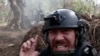 Ukraine - RFE/RL correspondent Maryan Kushnir reacts as Ukrainian forces fire artillery near Kupyansk, Kharkiv region - screen grab 4