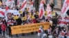 Members of the Belarusian diaspora celebrate the Day of Freedom in Vilnius, Lithuania, on March 25. 