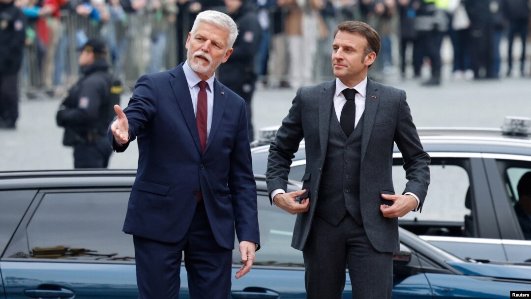 Czech President Petr Pavel (left) welcomes French President Emmanuel Macron at Prague Castle in Prague on March 5.