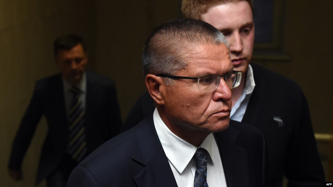 Aleksei Ulyukayev is escorted before a hearing at the Basmanny district court in Moscow on November 15.