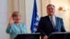 Nemačka kancelarka Angela Merkel sa članom Predsjedništva BiH Mladenom Ivanićem tokom posjete Sarajevu 2015. godine