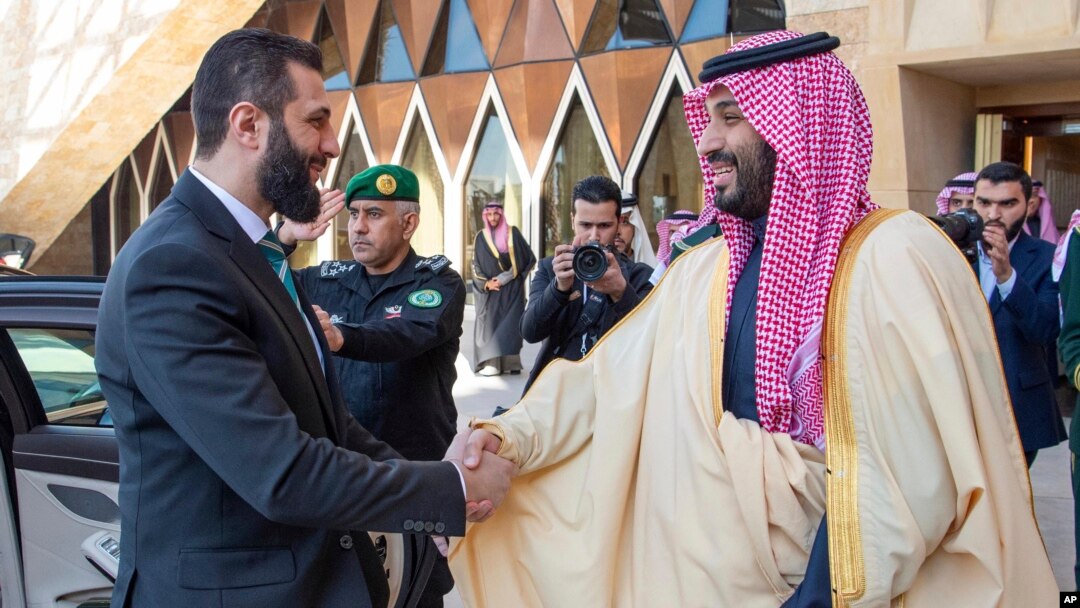Saudi Crown Prince Mohammed bin Salman greets Syria's interim president, Ahmad al-Sharaa, at the royal palace in Riyadh on February 2.