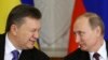 Віктор Янукович (л) та Володимир Путін (фото архівне)